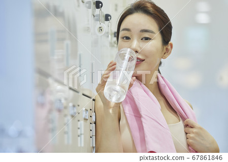 Relaxation, young woman, locker room, locker room, exercise, sports, health, fitness center, fitness center, sports center 67861846