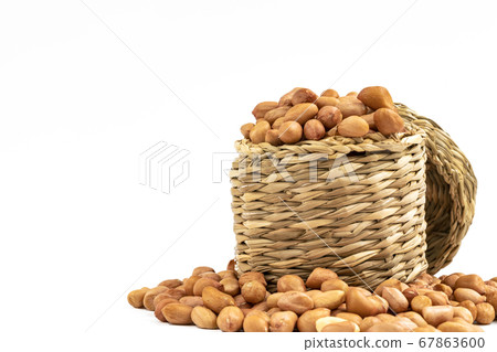 Close up peanuts in wicker 67863600