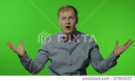 Man is mind blowing by your statement on chroma key background. Showing explosion of ideas Man is mind blowing by your statement on chroma key background. Showing explosion of ideas 67864025