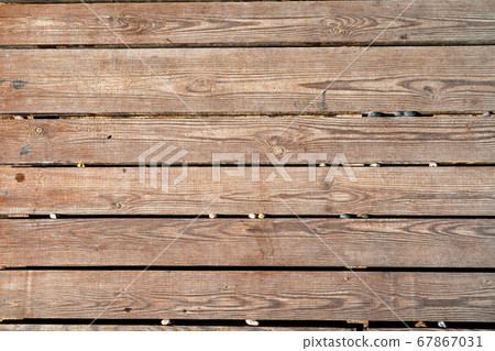 Brown dirty wooden floor planks background, top view 67867031