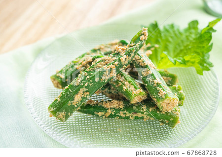 Okra sesame sauce on a glass plate Okra sesame sauce on a glass plate 67868728