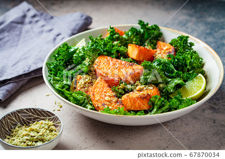 Baked sweet potato salad with kale in white bowl Baked sweet potato salad with kale in white bowl 67870034