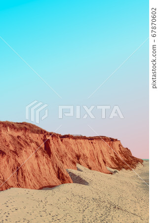 Red Cliff on Sylt island coastline at sunset.  67870602