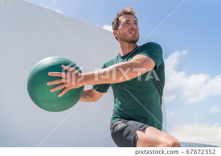 Fitness man training at gym working out Fitness man training at gym working out 67872352