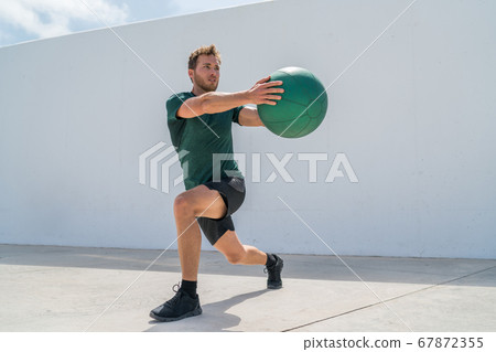Working out man training legs and core ab workout 67872355