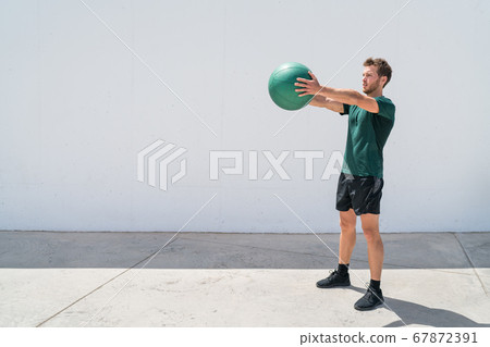 Medicine ball workout fitness man training arms 67872391