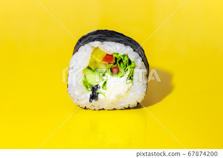 sushi on a yellow background close up sushi on a yellow background close up 67874200