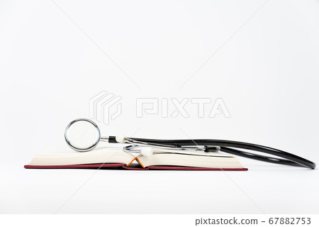Stethoscope on the book Stethoscope on the book 67882753