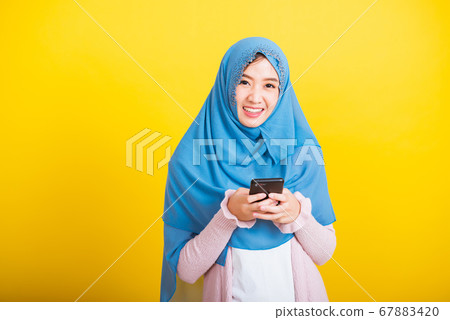 Asian Muslim Arab woman Islam wear hijab smile she 67883420