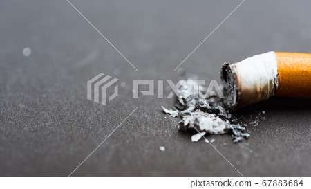 Pin down broken pile cigarette or tobacco on black Pin down broken pile cigarette or tobacco on black 67883684