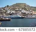 A ship staying at the port of Hydra island 67885072