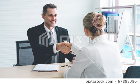 Job seeker in job interview meeting with manager 67885380