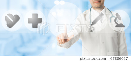Doctor Points at Copy Space with Medical Icons Doctor Points at Copy Space with Medical Icons 67886027
