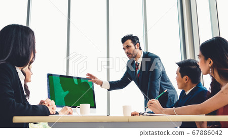 Business people in the conference room with green screen Business people in the conference room with green screen 67886042