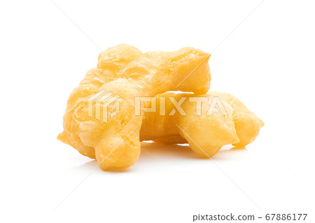 Youtiao deep-fried dough stick on a white 67886177