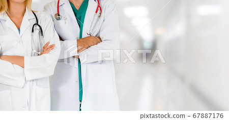 Doctors working with colleague in the hospital. Doctors working with colleague in the hospital. 67887176