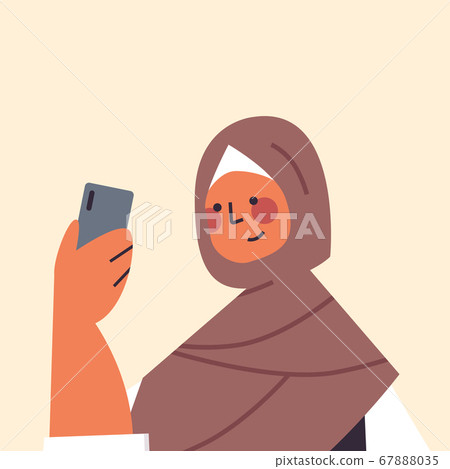 arabic woman in traditional clothes using smartphone smiling arab girl avatar female cartoon character 67888035