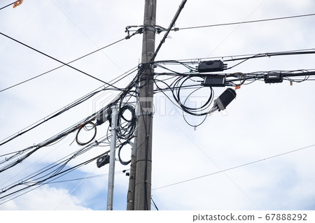 Communication line installed on a power pole Communication line installed on a power pole 67888292