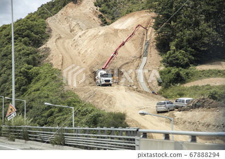 Cement pouring work for road construction Cement pouring work for road construction 67888294