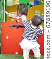 Baby in kids space 67889196