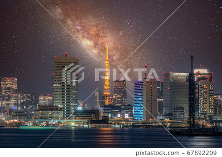 City night view Tokyo Tower and Milky Way composite 67892209