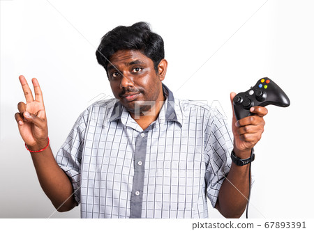 black man funny use hand playing video game pad black man funny use hand playing video game pad 67893391