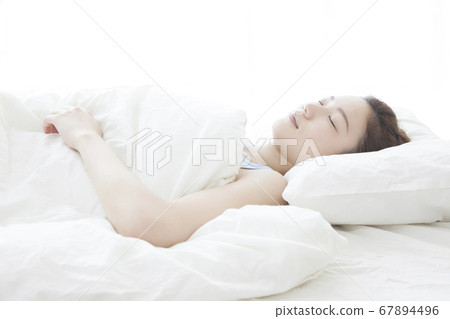 woman sleeping in bed woman sleeping in bed 67894496