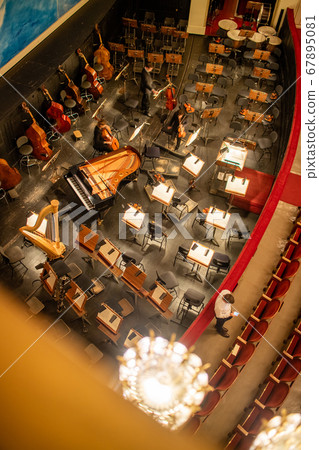 Orchestra pit without artists in the interior of the Vienna State Opera auditorium. Orchestra pit without artists in the interior of the Vienna State Opera auditorium. 67895081