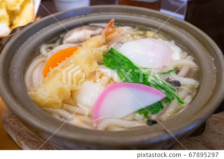 Tempura Nabeyaki Udon (udon noodles in a hot pot with shrimp, shiitake mushrooms, and mochi) Tempura Nabeyaki Udon (udon noodles in a hot pot with shrimp, shiitake mushrooms, and mochi) 67895297