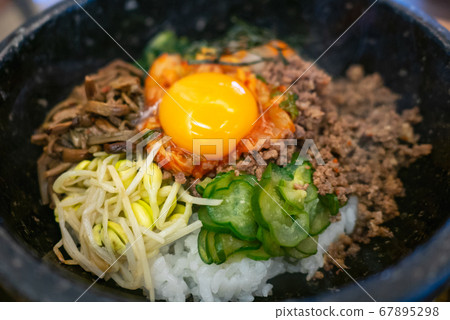 Korean food stone grilled bibimbap 67895298