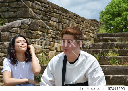 White couple dating in the park 67895393