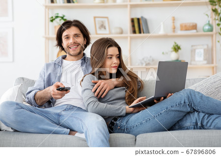 Relaxed married couple spending weekend at home 67896806