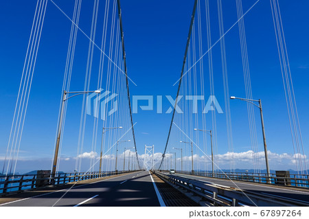 Running on the Seto Ohashi Bridge in the midsummer blue sky (Minami Bisan Seto Ohashi Bridge) 67897264