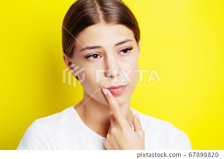 Young woman has cold sores on her lips Young woman has cold sores on her lips 67898820