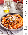 Spaghetti bolognese with mushrooms and cheese. 67899277