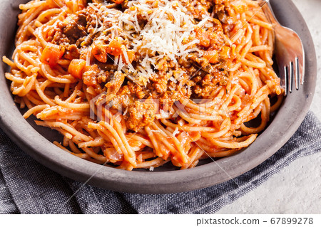 Spaghetti bolognese with mushrooms and cheese. Spaghetti bolognese with mushrooms and cheese. 67899278