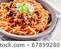 Spaghetti bolognese with mushrooms and cheese. 67899280