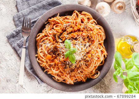 Spaghetti bolognese with mushrooms and cheese. Spaghetti bolognese with mushrooms and cheese. 67899284