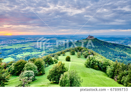 Hilltop Hohenzollern Castle on mountain top in Hilltop Hohenzollern Castle on mountain top in 67899733