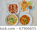 Traditional Roasted streaky pork, Tom Yum kung, Fried Calamari and Sweet and Sour Chicken, manu set for dinner 67900655