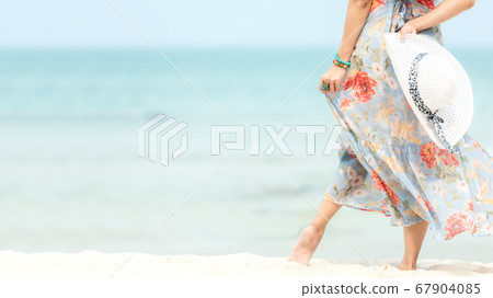 Summer Holiday. Lifestyle woman chill holding big white hat Summer Holiday. Lifestyle woman chill holding big white hat 67904085