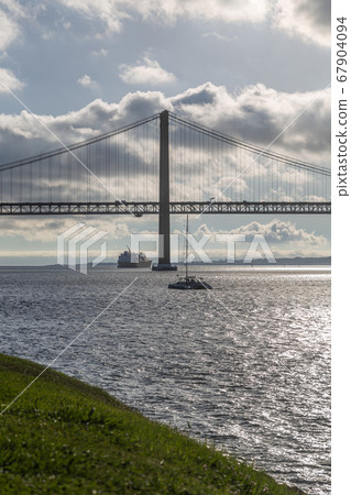 Bridge on April 25 in Lisbon on the Tejo river Bridge on April 25 in Lisbon on the Tejo river 67904094