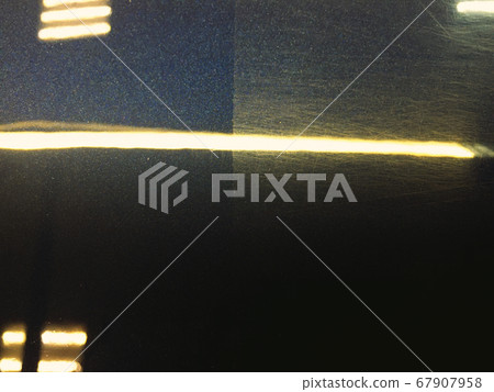 Polishing car - difference befora and after. Swirl marks and scratches and mirror glaze at polished surface. 67907958