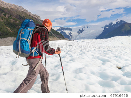 Hiker on glacier Hiker on glacier 67916436