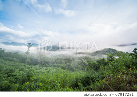 Panorama view blue sky and cloudy of nature and top view of mountain and forest in Khao Kho, Phetchabun Province. One of the most popular attractions in Thailand. Panorama view blue sky and cloudy of nature and top view of mountain and forest in Khao Kho, Phetchabun Province. One of the most popular attractions in Thailand. 67917281