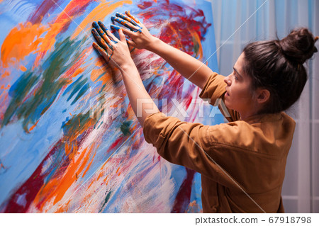 Creative artist painting with fingers Creative artist painting with fingers 67918798