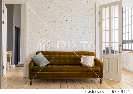 Comfortable sofa in cozy living room Comfortable sofa in cozy living room 67919105