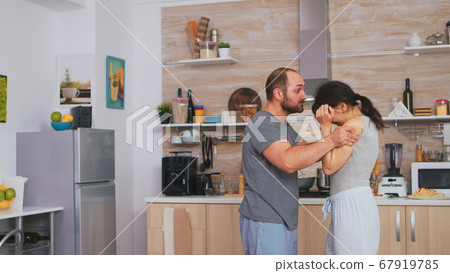 Aggressive man threating to hit wife Aggressive man threating to hit wife 67919785