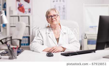 Confident senior female doctor Confident senior female doctor 67919851