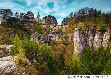 Picturesque medieval Bastei stone bridge in summer, Germany, Saxon Switzerland  67919954